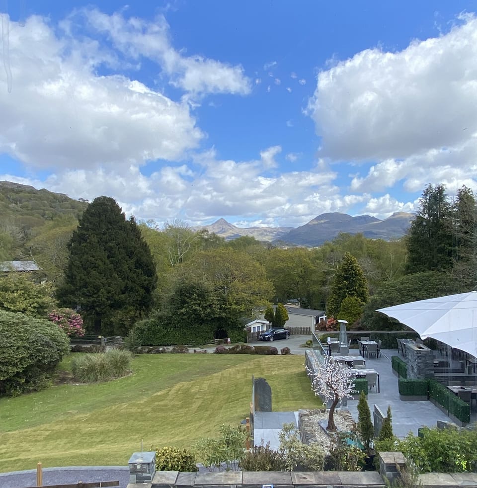 Four Poster Room, 1 King Bed, Double Power Shower, Mountain View | Iron/ironing board, free WiFi, bed sheets