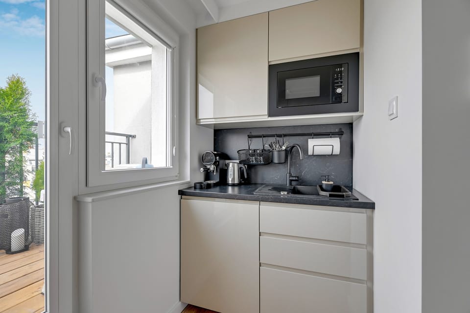 Classic Apartment, Balcony, City View | Private kitchenette | Espresso maker, electric kettle