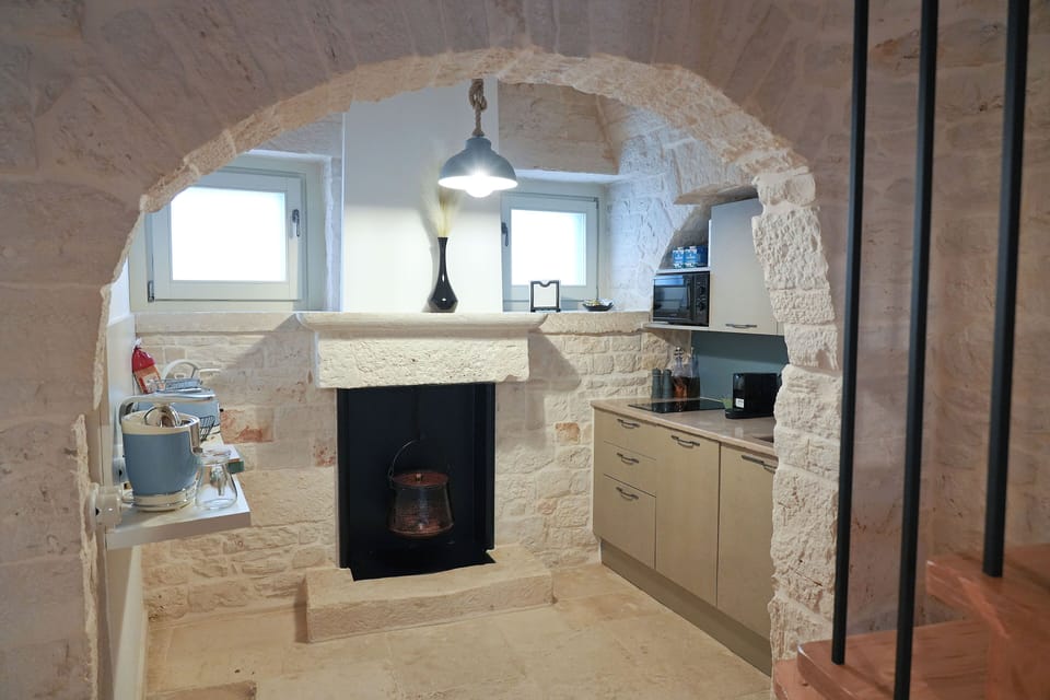 Trullo Superior | Private kitchen | Full-size fridge, microwave, stovetop, dishwasher