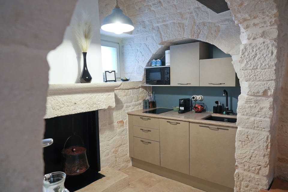 Trullo Superior | Private kitchen | Full-size fridge, microwave, stovetop, dishwasher