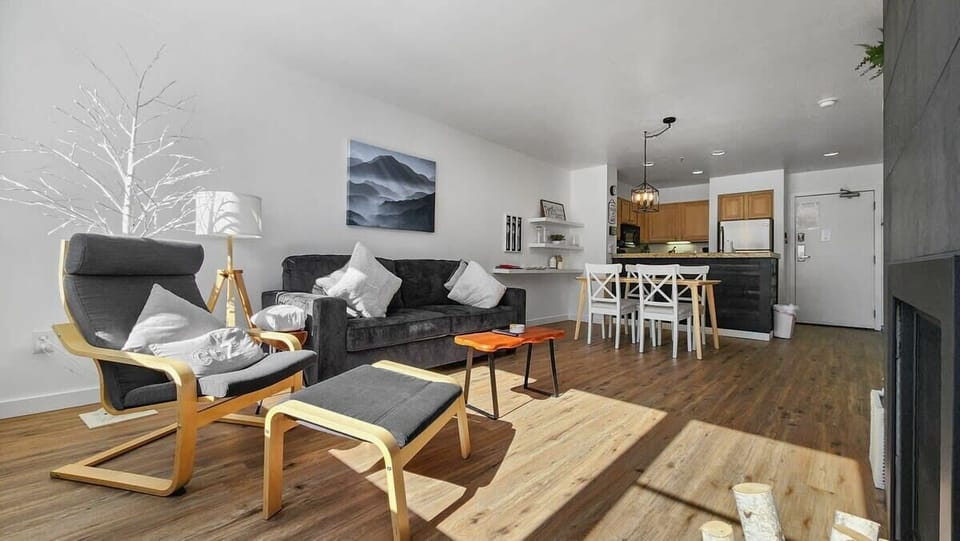 The home boasts an open layout with the kitchen/dining/living room seamlessly blending together in one bright and social space.
