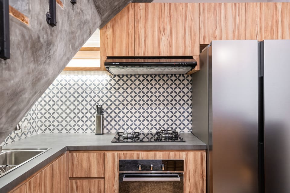 Villa | Private kitchen | Fridge, cookware/dishes/utensils, cleaning supplies, dining tables