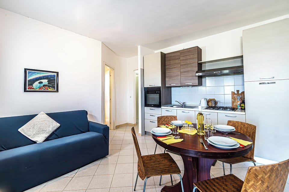 Standard Townhome, Multiple Bedrooms (3 Le Perle Di Stintino) | Living area | 21-inch TV with digital channels