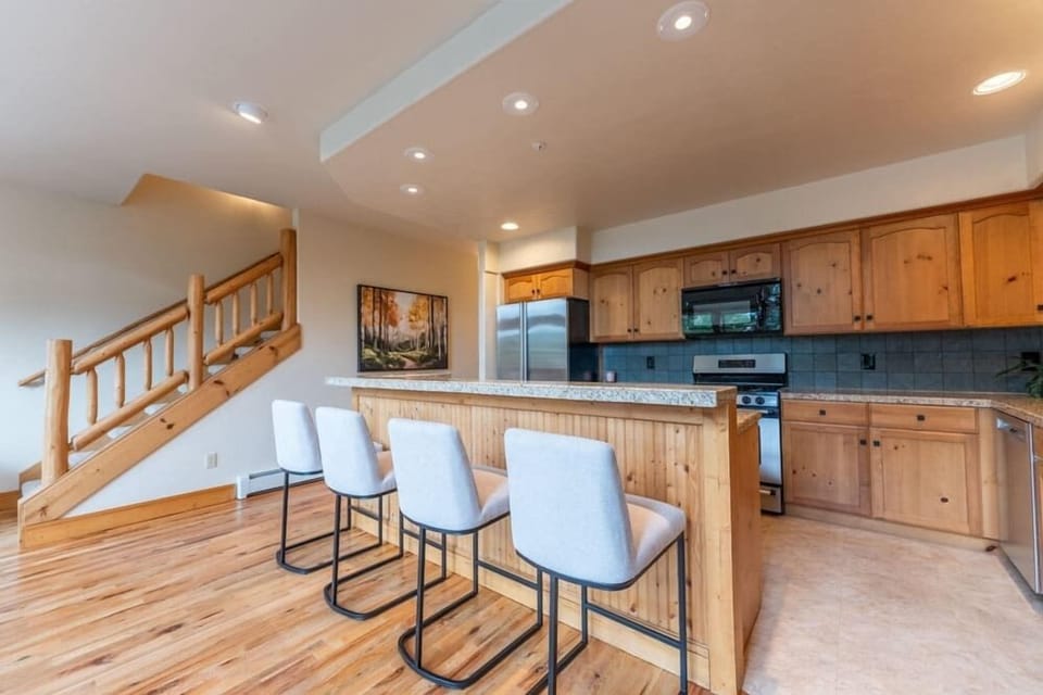 Kitchen, stairs to 3rd floor