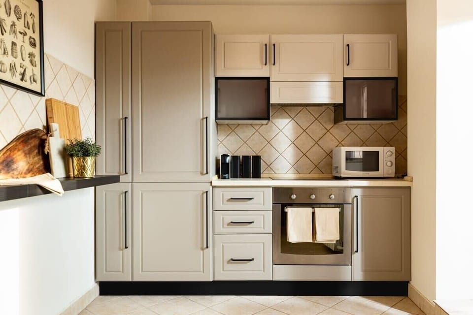 Step into culinary luxury in our gourmet kitchen, where meticulous details and high-end finishes create an exquisite space for culinary creativity and indulgence.
