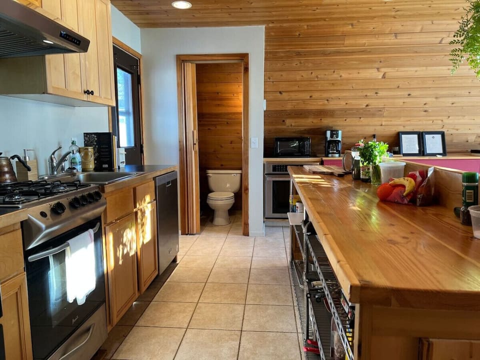 Lots of counter space for prepping food in the well-stocked and open A-Frame kitchen -- we`ve got all the kitchen gear you need (and good sharp knives, too).