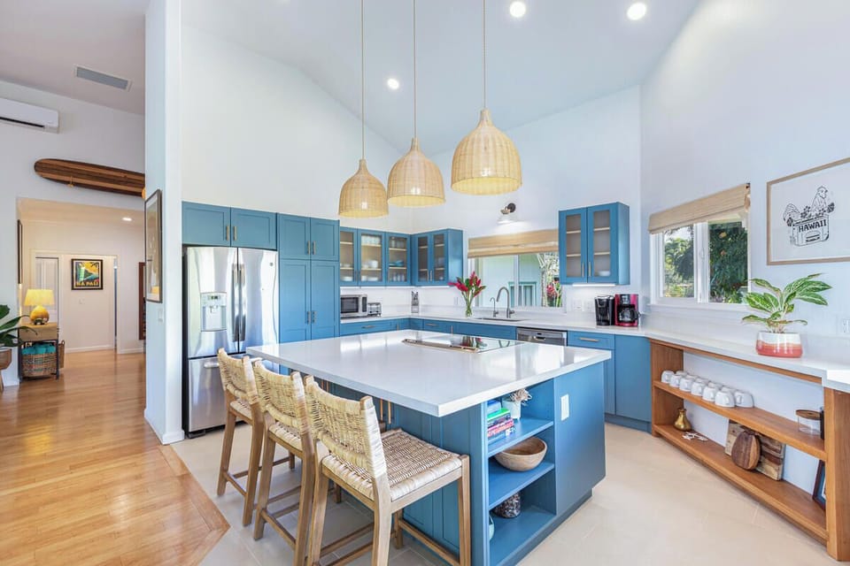 Start your morning at the spacious island, perfect for coffee, conversation, or a quick bite before heading out.
