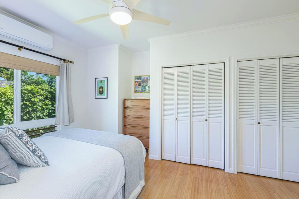 Settle into this inviting queen bedroom with ample closet space and A/C for a relaxing stay.
