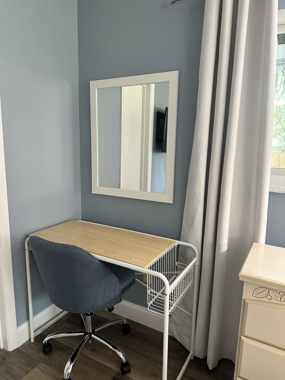 Desk for working or putting on makeup. Makeup mirror provided.