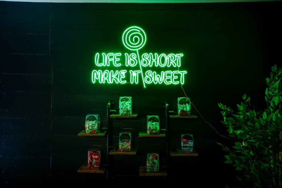 The candy bar located behind the old store counter, and the theater area.