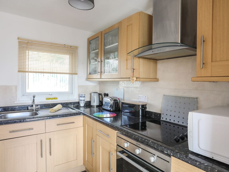 Fridge, electric kettle, toaster, cookware/dishes/utensils