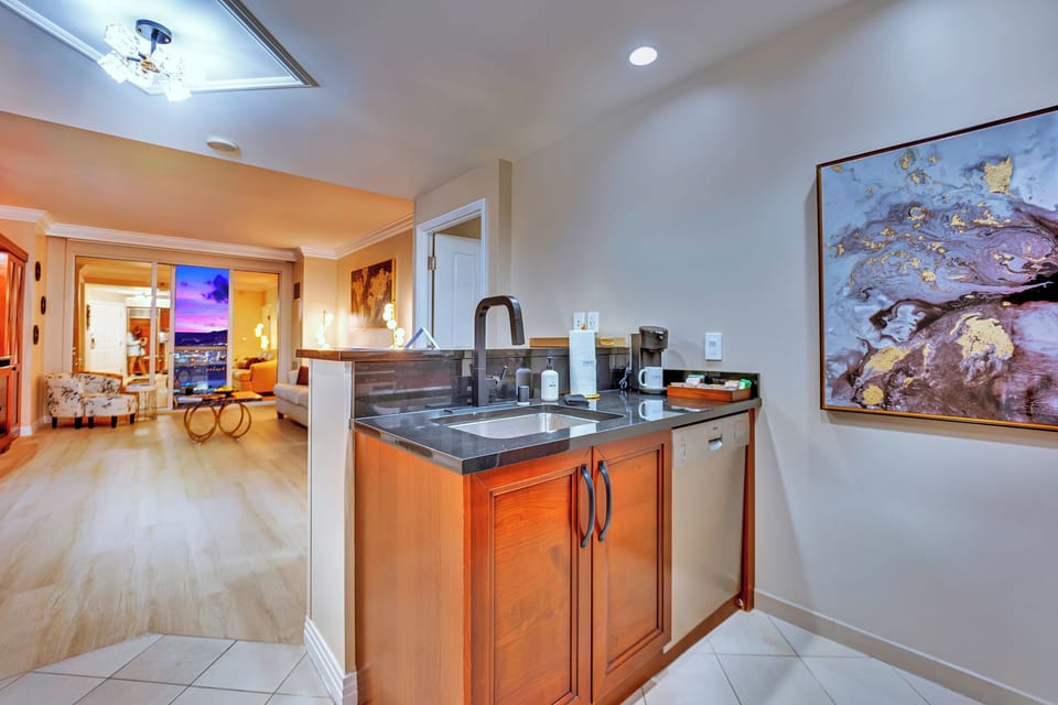 Cook in style with Subzero & Miele appliances, granite countertops, and everything needed to prepare a meal in this upscale kitchen.