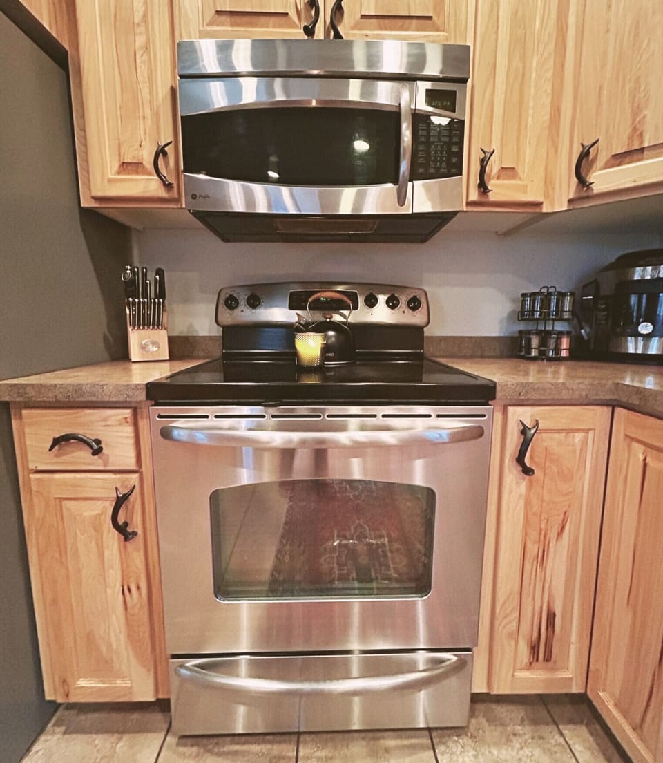 Sleek stainless steel appliances—a modern kitchen for your convenience.