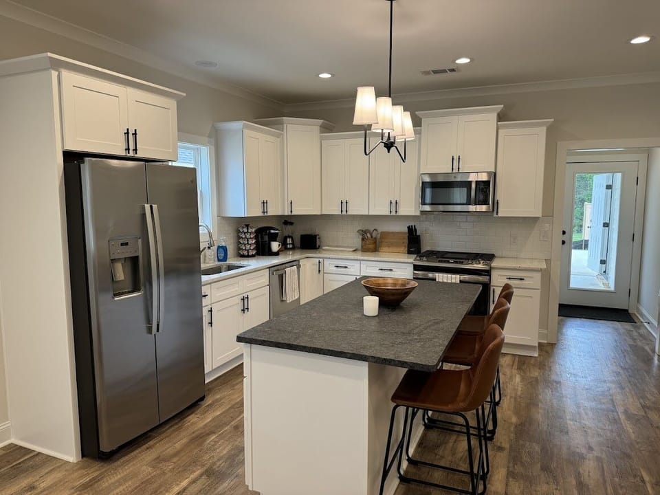 Loaded kitchen. High end appliances.  All utensils and dishes you need.