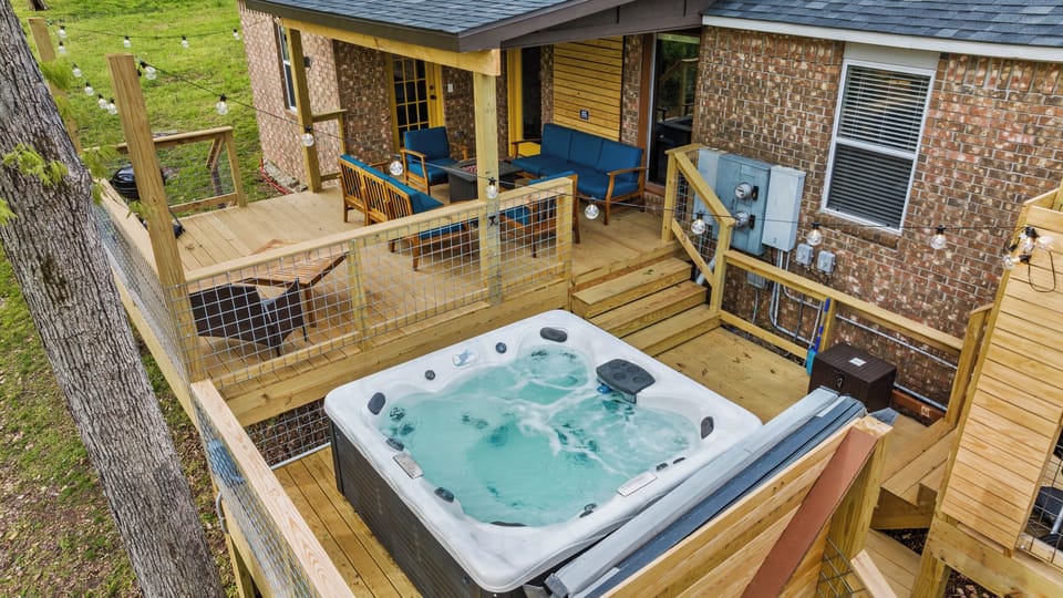 Private decks, hot tub, tabletop fire pit, & views of the bike trails!