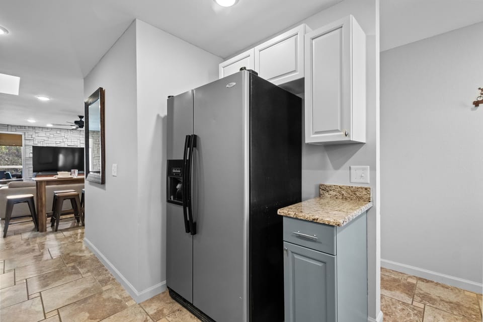 Kitchen leads into dining & living!