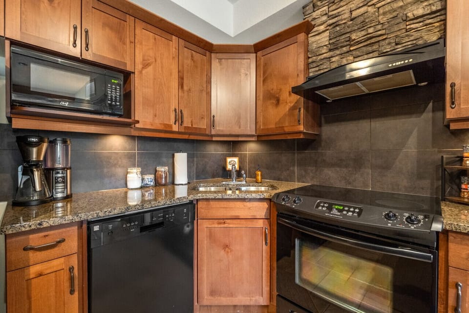 Full kitchen with amazing bonus amenities such as a slow cooker, rice maker, blender & waffle maker