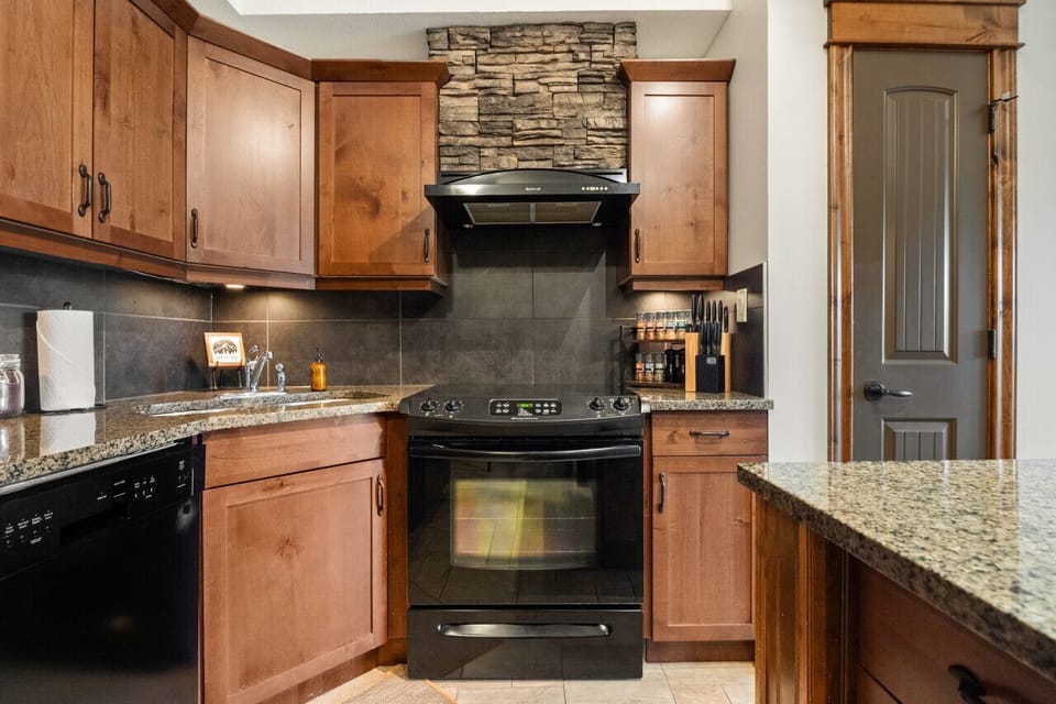 Full kitchen with amazing bonus amenities such as a slow cooker, rice maker, blender & waffle maker