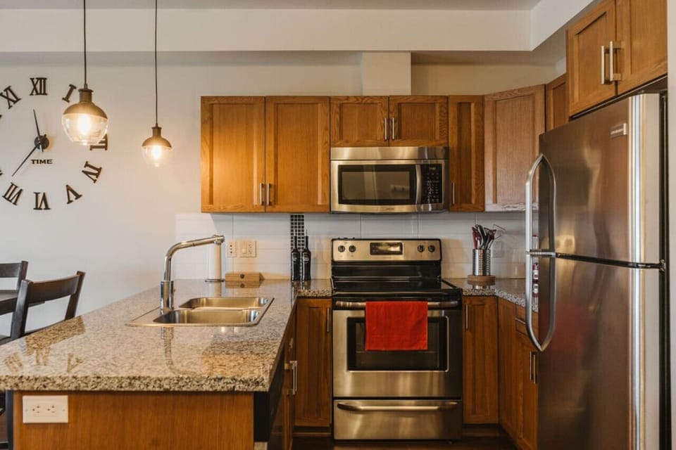 The kitchen is fully stocked for cooking. There is a microwave, stove, dishwasher, fridge, coffee machine, toaster, and all the essentials you`ll need.