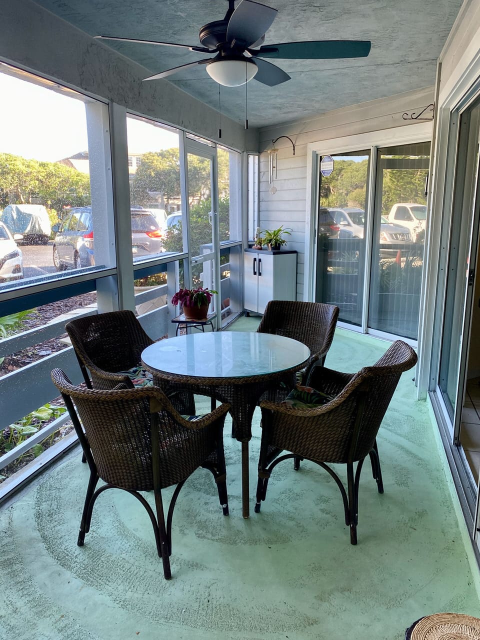 Screened porch with dining table