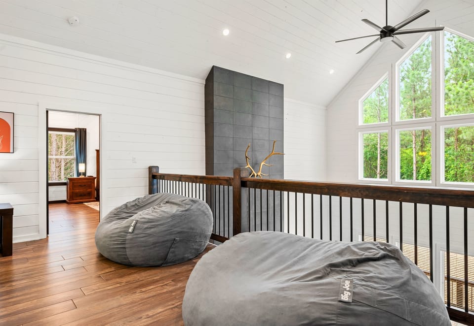 This indoor fun zone invites you to play and relax in a cozy, vibrant setting.