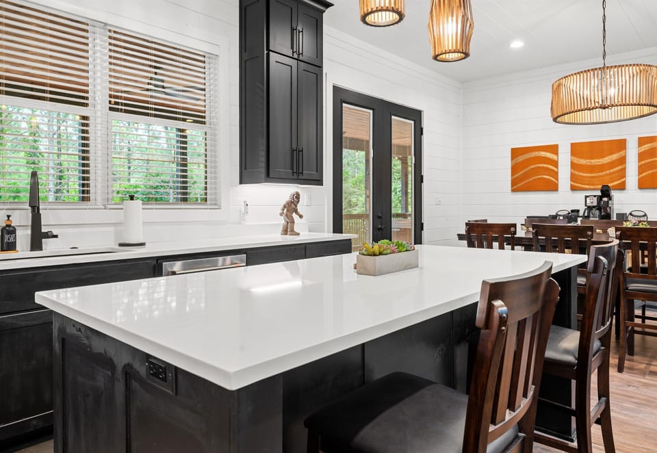 A seamless blend of modern aesthetics and cozy charm, this kitchen is both stylish and functional.