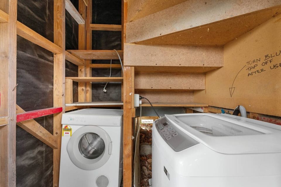 Separate area for washing machine & dryer - walk to the end of carport - door on your left