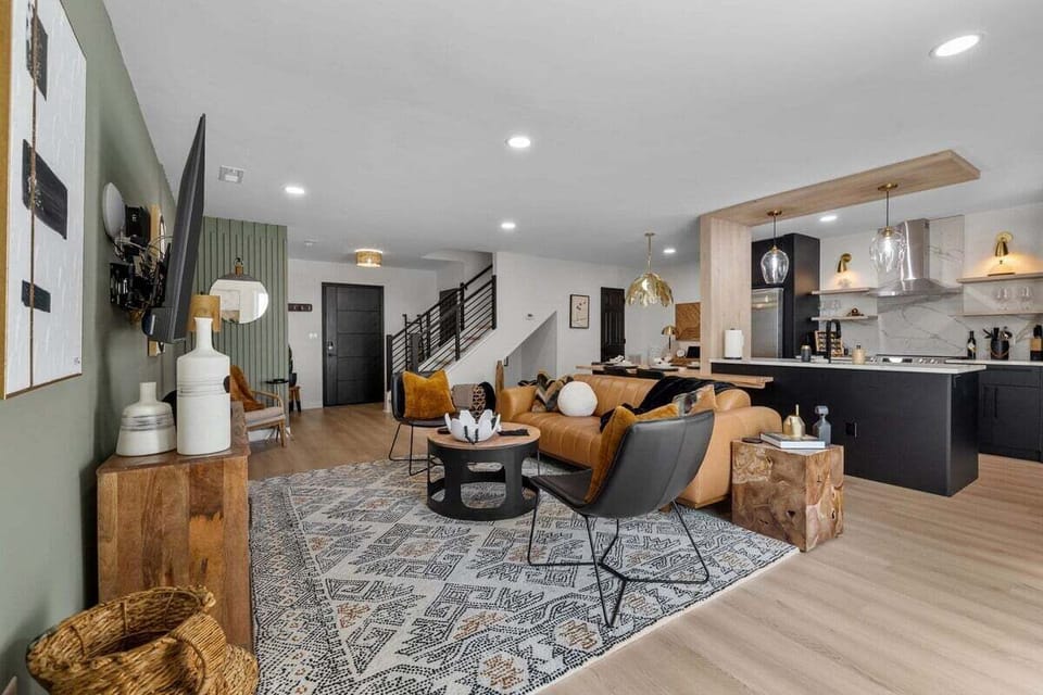 Discover the joy of open-concept living in our spacious and modern living room, perfect for gathering and making memories.