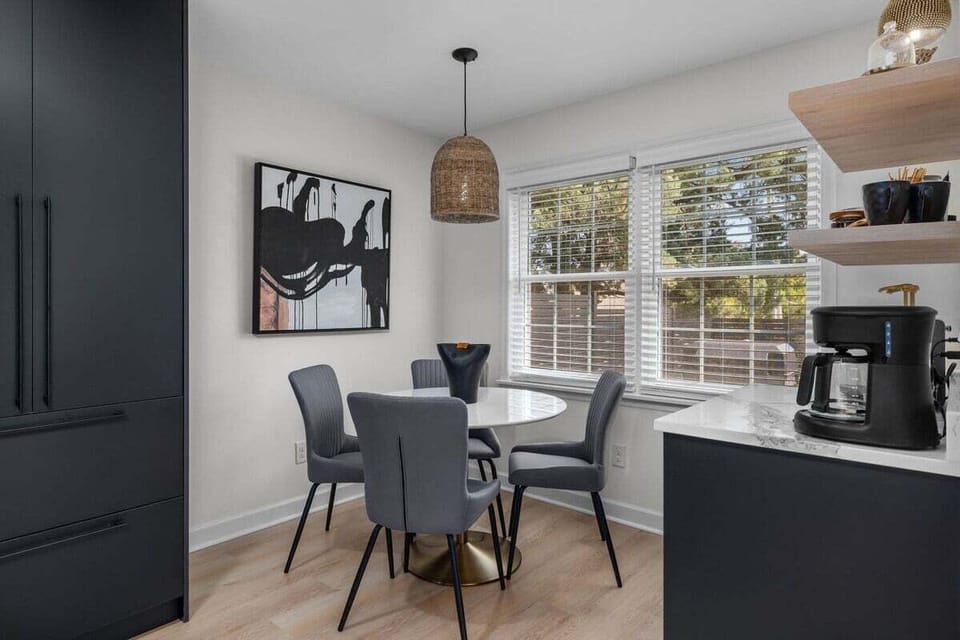 Savor the flavors of your favorite dishes in our inviting dining space, thoughtfully designed within the open-concept layout for a communal dining experience.