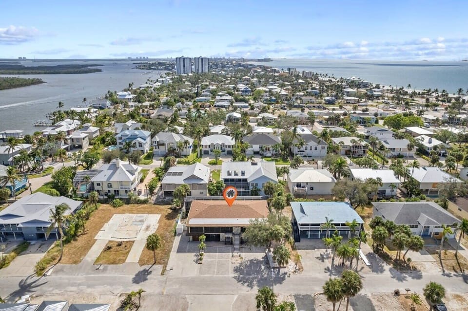 Aerial shots showing proximity to beach and bay