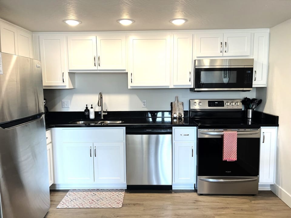 Whip up a delicious meal in the fully equipped kitchen - the heart of your cozy condo that's sure to inspire your inner chef!