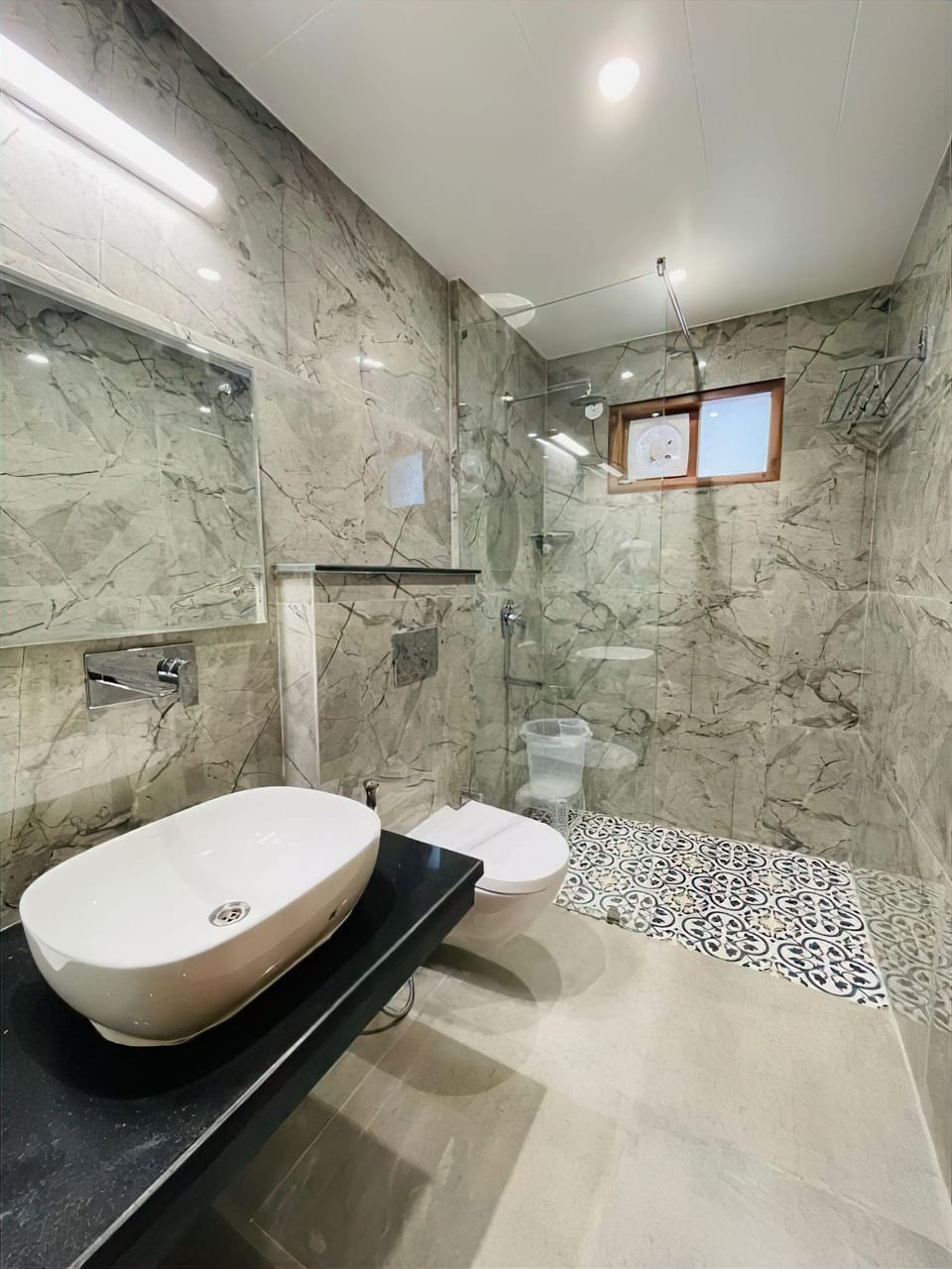Shower, free toiletries, hair dryer, slippers