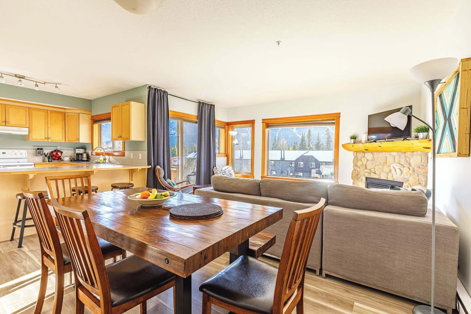 Share a meal with friends or family in the spacious dining area, complete with mountain views