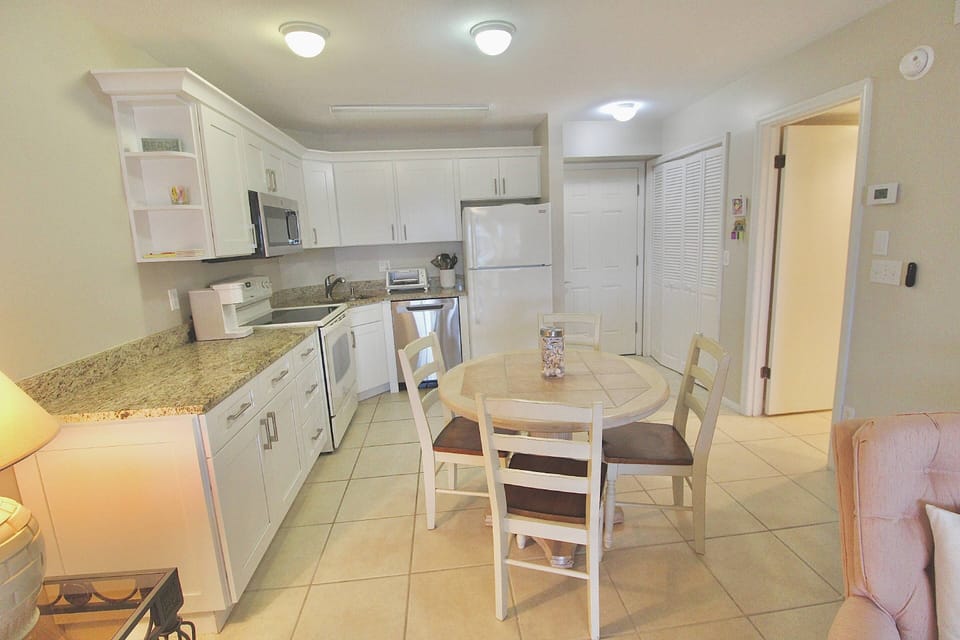 The Dining table seats 4 and the kitchen is fully stocked with all you need to prep and cook.