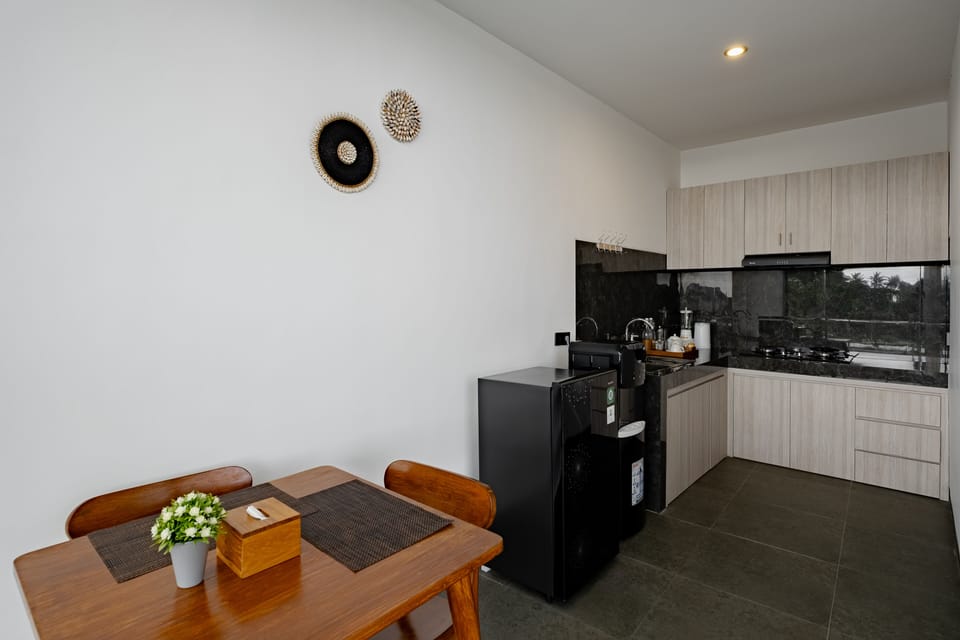 Villa | Private kitchen | Electric kettle, dining tables