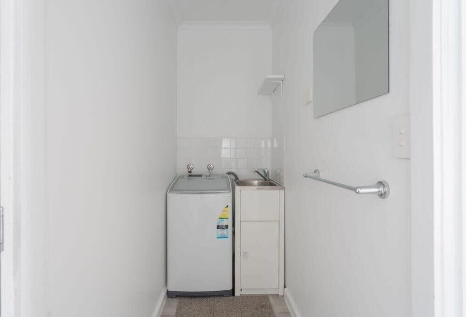 Enter into the laundry and separate toilet