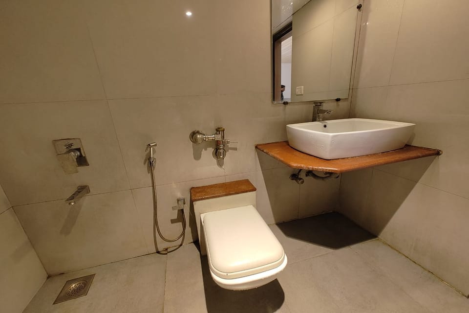 Shower, rainfall showerhead, towels