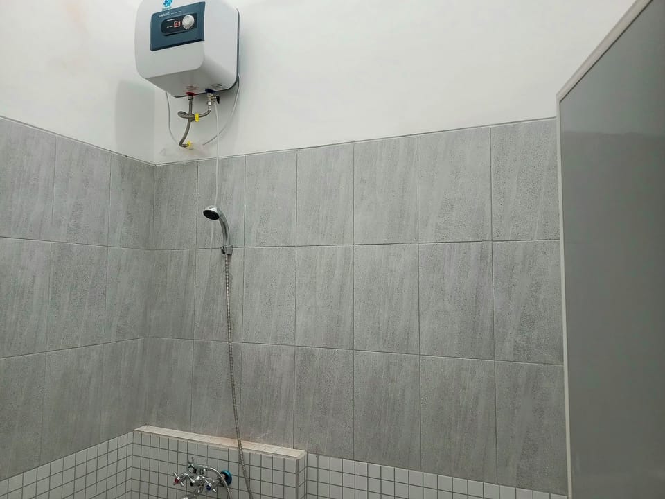 Shower, rainfall showerhead, towels, soap