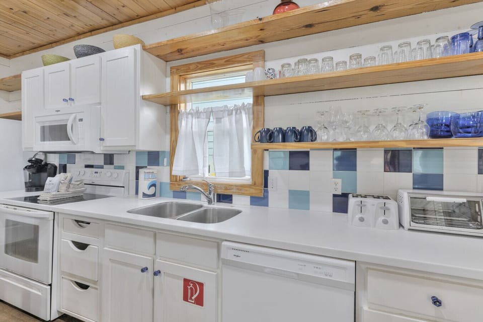 Fully equipped coastal kitchen with ample counter space