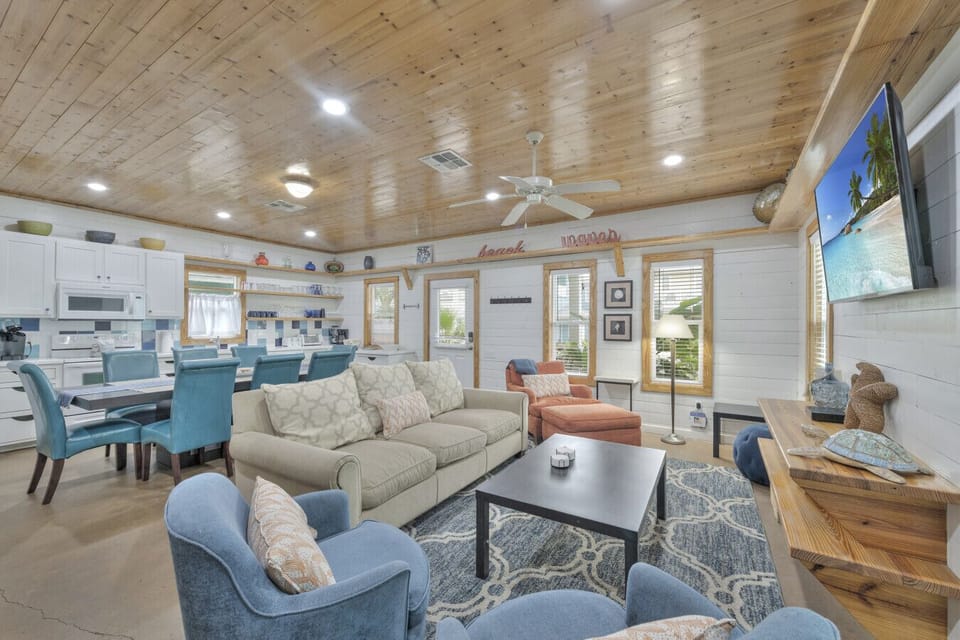 Open-concept living and dining space with abundant natural light