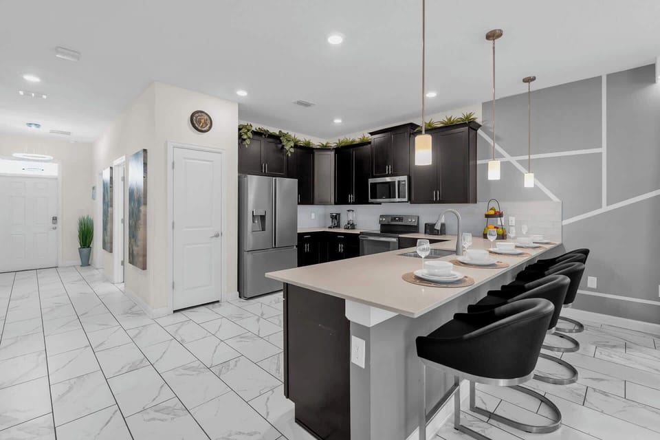 Fully Equipped Kitchen with Bar Seating
