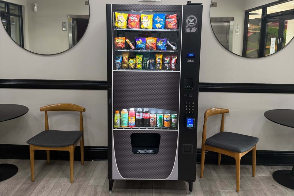 Lobby vending machine for quick snacks and drinks anytime.