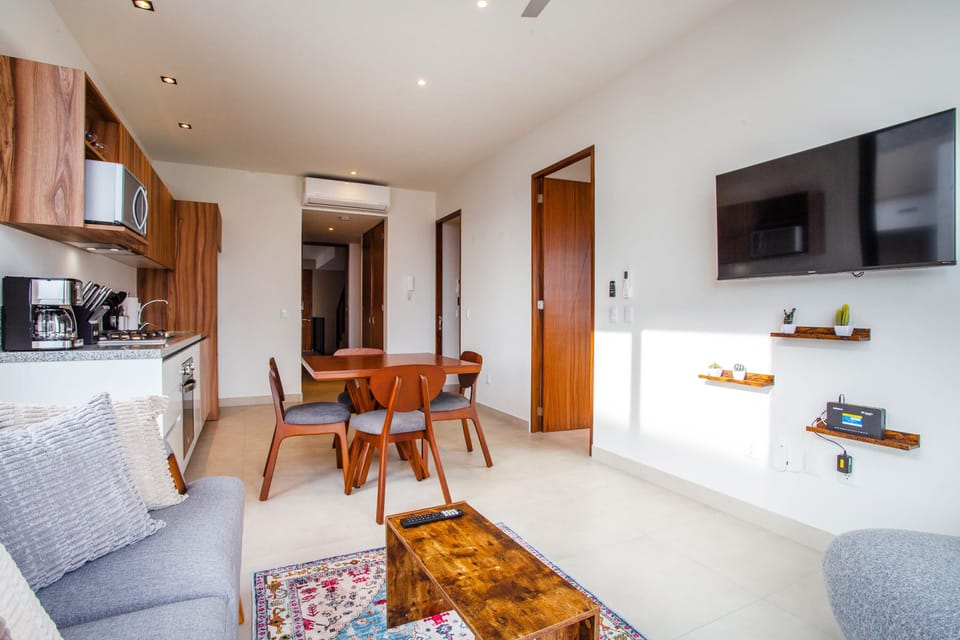 The living room is comfortable and has a smart TV for your entertainment