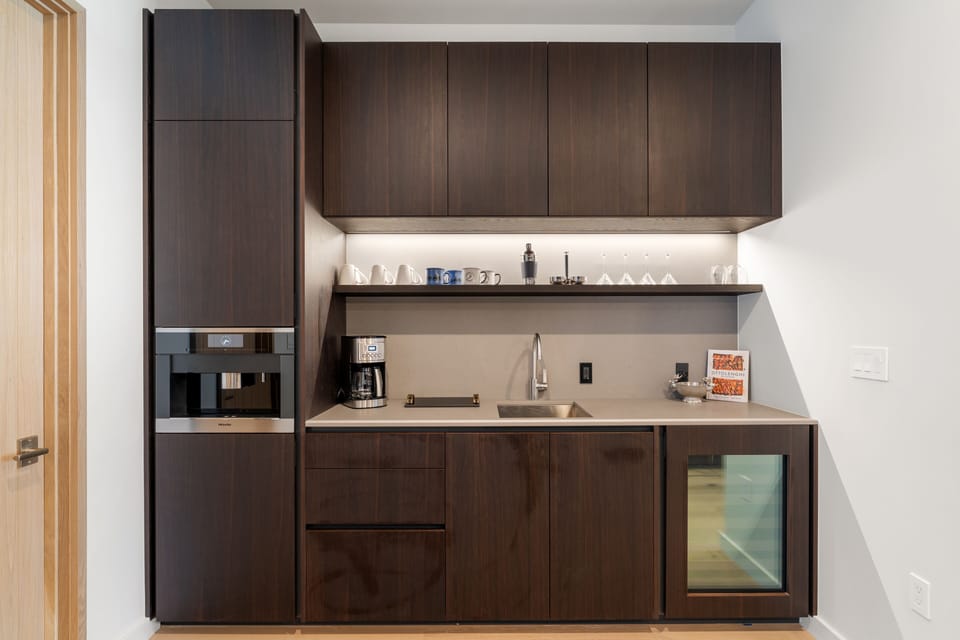 Luxury Townhome | Living area | 50-inch Smart TV with cable channels, fireplace