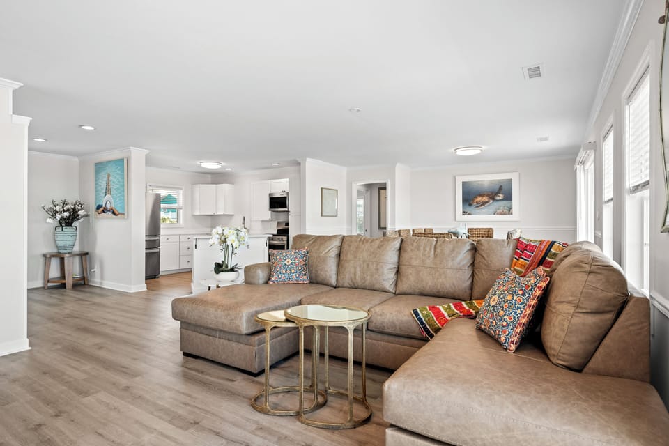 Sink into this spacious living area, where natural light and an open layout invite you to relax and feel right at home.