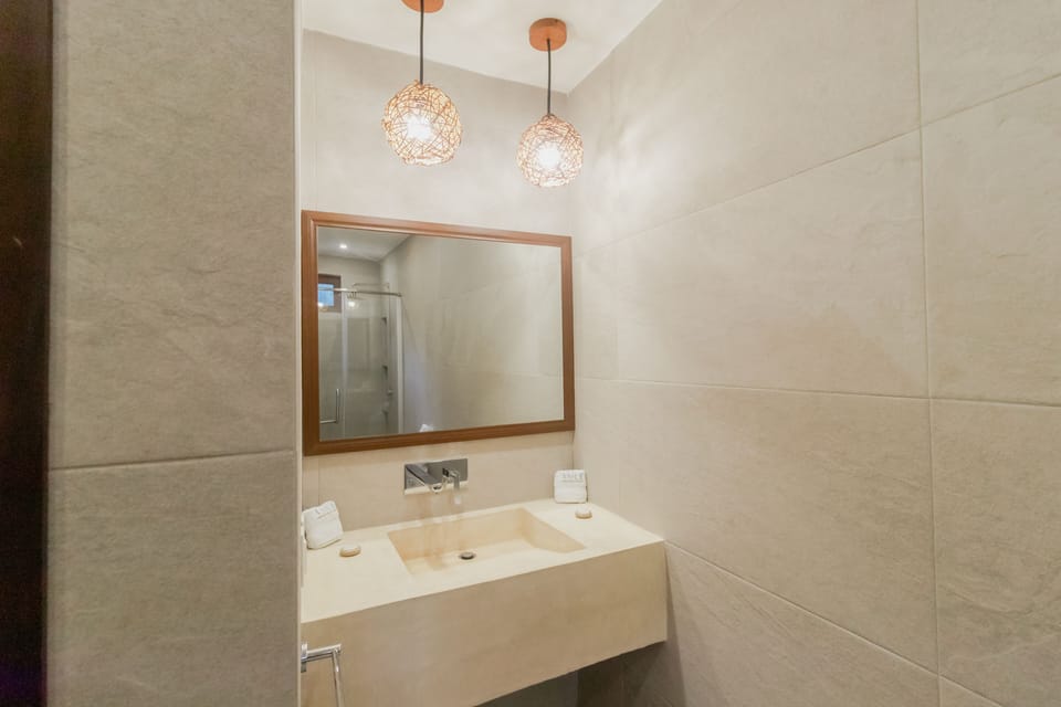 Deluxe Cabin, 1 King Bed, Lagoon View | Bathroom | Shower, hair dryer, towels, soap