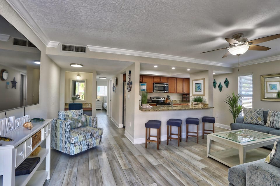 Condo, 1 King Bed with Sofa bed (Westwinds 213) | Living area | TV