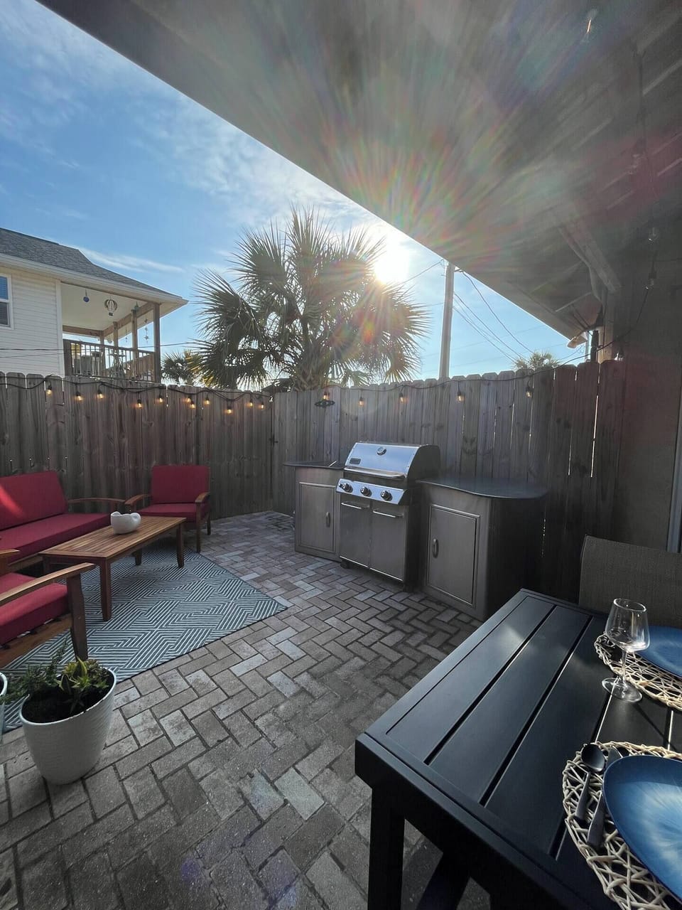 Enjoy the cozy backyard area- you even can see the sunrise back here and see the sunset on the front balcony. 