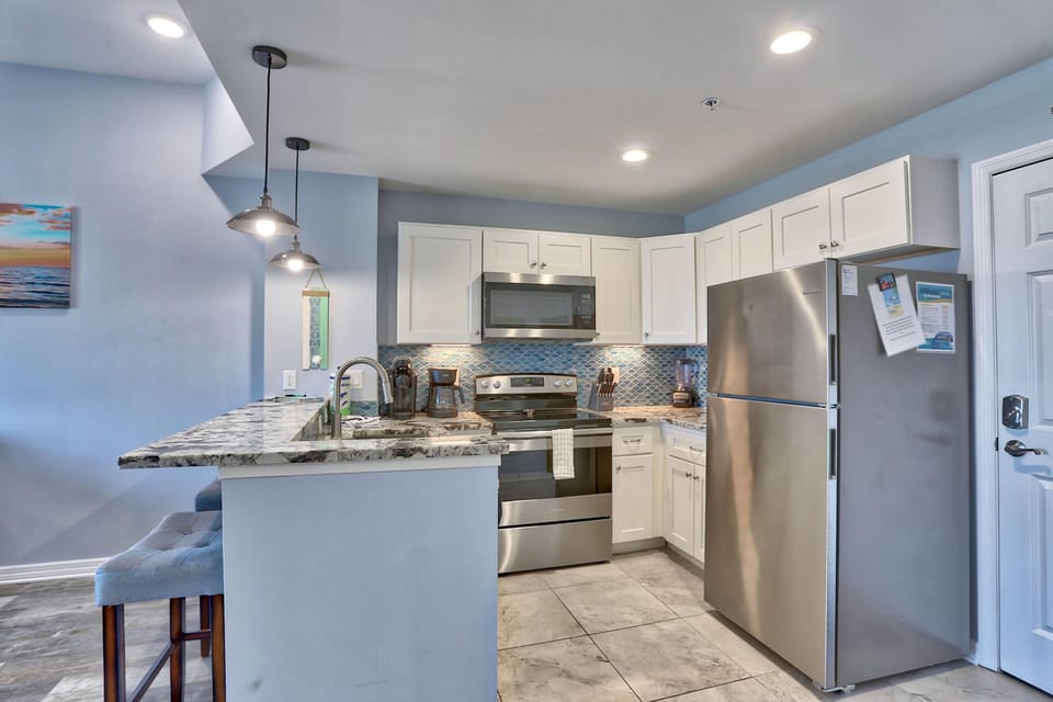 Condo, 1 King Bed with Sofa bed (Madeira Bay Resort I 1502) | Private kitchen | Oven