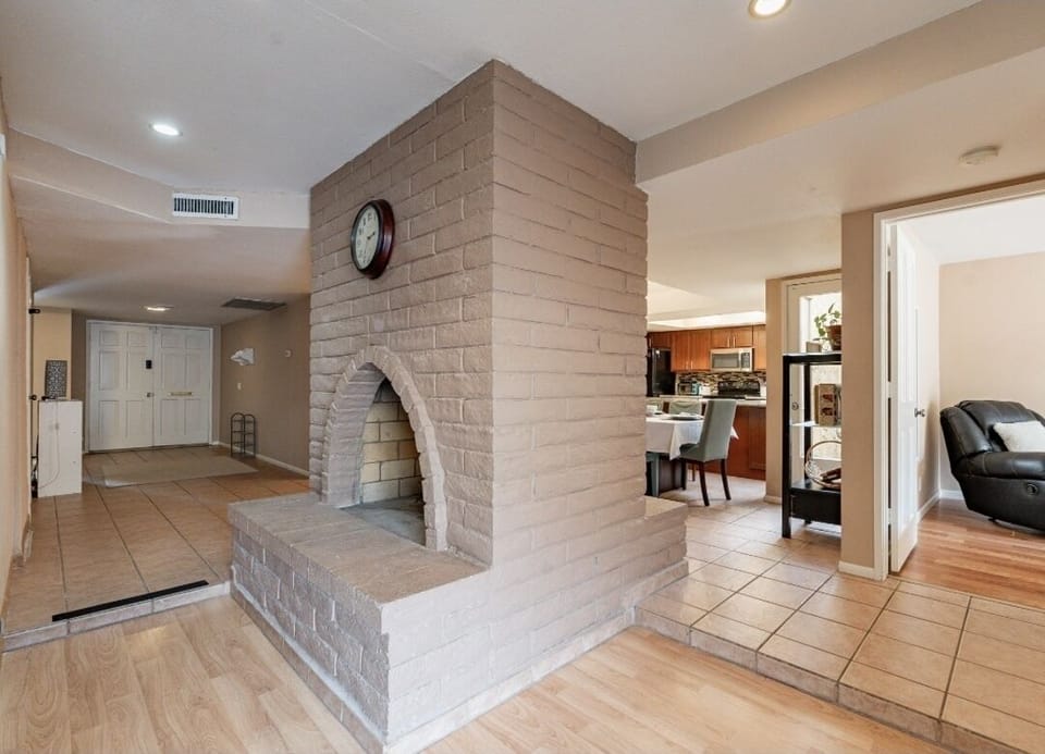 Two-way Fireplace make cold nights cozy.  Firewood is supplied for your use. 